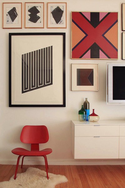 This beautiful gallery wall by Wyeth Alexander is perfectly whimsical and sophisticated with the Op Art piece and use of color on and off the wall.