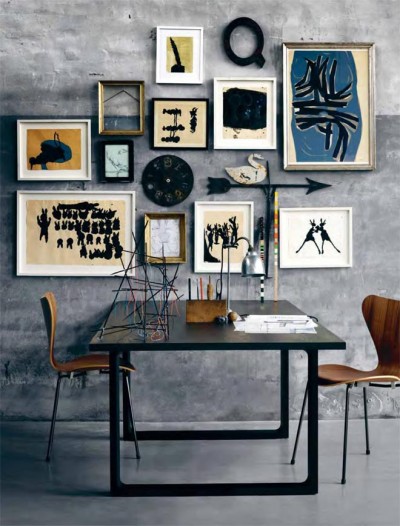 This wonderful collection of art creates a cohesive, a almost thematic gallery wall. The objects or accessories for table are also in perfect keeping for this masculine, sophisticated bohemian look.