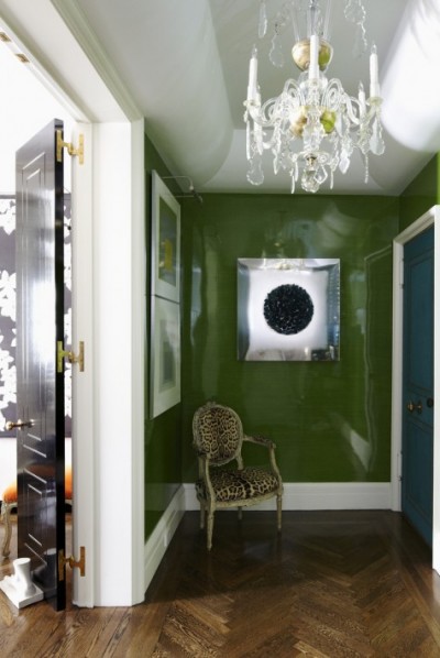 Todd Romano created a very sophisticated foyer in lacquered avocado with a rich teal blue door.