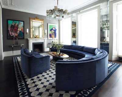 An elegant arc deco inspired design allow this rug to make the biggest statement in this room.